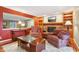 Comfortable living room with a fireplace, bookshelves, and a large coffee table at 1250 W 141St St, Carmel, IN 46032