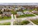 Overhead shot of a neighborhood showcasing the house and surrounding properties and landscaping at 12526 Pembrooke Cir, Carmel, IN 46032