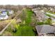 Lush backyard featuring a well-maintained lawn, mature trees, and landscaping for privacy and serenity at 12526 Pembrooke Cir, Carmel, IN 46032