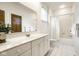 Bathroom featuring a vanity, shower-tub combo with a curtain, and tiled flooring at 12526 Pembrooke Cir, Carmel, IN 46032