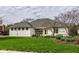 Charming home with a well-manicured lawn and attractive landscaping, creating inviting curb appeal at 12526 Pembrooke Cir, Carmel, IN 46032