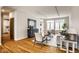 Bright and airy living room featuring hardwood floors and comfortable seating arrangement at 12526 Pembrooke Cir, Carmel, IN 46032