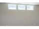 Finished basement with three windows letting in natural light at 1499 Avondale Dr, Westfield, IN 46074