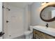 Modern bathroom with white subway tile shower and rustic vanity at 1499 Avondale Dr, Westfield, IN 46074