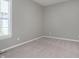 Neutral bedroom with window and carpet flooring at 1499 Avondale Dr, Westfield, IN 46074