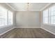 Traditional dining room featuring ample natural light and hardwood floors at 1499 Avondale Dr, Westfield, IN 46074