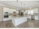 Gourmet kitchen with granite counters, stainless appliances, and center island at 1499 Avondale Dr, Westfield, IN 46074