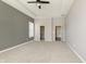 Spacious main bedroom featuring a tray ceiling, carpet floors, and ample closet space at 1499 Avondale Dr, Westfield, IN 46074