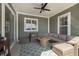 Relaxing covered porch with comfortable seating at 1499 Avondale Dr, Westfield, IN 46074