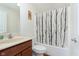 Standard bathroom with a tub/shower combination, single sink vanity, and neutral finishes at 1590 Blackthorne N Trl, Plainfield, IN 46168