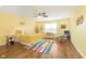 Bright bedroom with hardwood floors, ceiling fan, accent furniture and lots of natural light at 1590 Blackthorne N Trl, Plainfield, IN 46168
