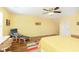 Bright bedroom with hardwood floors, ceiling fan, accent furniture and lots of natural light at 1590 Blackthorne N Trl, Plainfield, IN 46168