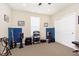 Soundproofed music room with an electric guitar, speakers, and carpet flooring at 1590 Blackthorne N Trl, Plainfield, IN 46168