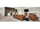 Finished basement featuring a cozy seating area, fireplace, and a bar area with built-in wine coolers at 1603 Nowland Ave, Indianapolis, IN 46201