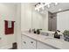 Bathroom featuring dual sinks, modern fixtures, and a glass enclosed shower at 1603 Nowland Ave, Indianapolis, IN 46201