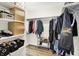 Walk-in closet with neatly organized shelves, clothing racks and shoe rack at 1603 Nowland Ave, Indianapolis, IN 46201