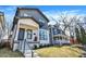 Attractive two-story house with a covered front porch, set in a neighborhood setting at 1603 Nowland Ave, Indianapolis, IN 46201