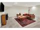 Comfortable living room with a plush sofa, accent chair, and stylish rug creates a relaxing atmosphere at 1603 Nowland Ave, Indianapolis, IN 46201
