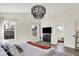 Bright main bedroom with high ceilings, large windows, and comfortable bedding at 1603 Nowland Ave, Indianapolis, IN 46201
