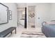 Bright bedroom with a view of the ensuite bathroom, decorated with stylish decor and a neutral color palette at 20834 Waterscape Way, Noblesville, IN 46062