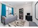 Bedroom features a daybed, bookshelf, and a window with ample natural light at 20834 Waterscape Way, Noblesville, IN 46062