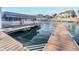 Dock with boat and marina, offering convenient access to the water and stunning waterfront views at 20834 Waterscape Way, Noblesville, IN 46062