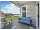 Inviting patio with comfortable seating, offering views of the well-manicured lawn and tranquil lake at 20834 Waterscape Way, Noblesville, IN 46062