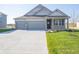Charming single-Gathering home featuring a two-car garage and well-maintained front lawn at 2268 Oakmont Dr, Plainfield, IN 46168
