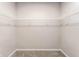 Walk-in closet with carpet flooring and white wire shelving at 2352 Somerset Cir, Franklin, IN 46131