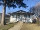 Charming single-story home with well-maintained landscaping, concrete walk, and inviting front entrance at 238 N 7Th Ave, Beech Grove, IN 46107