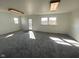 Bright and airy living room with new carpeting, fresh paint, and ample natural light at 238 N 7Th Ave, Beech Grove, IN 46107