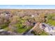 Aerial view of the property showcasing its lush landscaping, mature trees, and neighborhood setting at 241 Melissa Ann Ct, Indianapolis, IN 46234