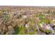 Aerial view of property showcasing a lush, tree-filled neighborhood setting at 241 Melissa Ann Ct, Indianapolis, IN 46234