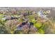 Beautiful aerial view of the property showcasing the landscaping, lawn, and trees at 241 Melissa Ann Ct, Indianapolis, IN 46234