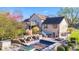 A spacious backyard featuring a pool, patio, and outdoor seating area at 241 Melissa Ann Ct, Indianapolis, IN 46234