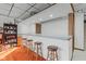 Basement features a bar area with counter seating for entertaining Gathering and friends at 241 Melissa Ann Ct, Indianapolis, IN 46234