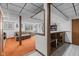 Finished basement features a bar area, comfortable seating, and ample natural light from a large window at 241 Melissa Ann Ct, Indianapolis, IN 46234