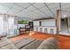 Basement living area with comfortable seating, entertainment system and stairs to the upper level at 241 Melissa Ann Ct, Indianapolis, IN 46234