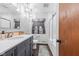 Stylish bathroom features a modern vanity, sleek fixtures, and decorative wall art at 241 Melissa Ann Ct, Indianapolis, IN 46234