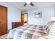 Bright bedroom features a view into an adjoining room and ample closet space at 241 Melissa Ann Ct, Indianapolis, IN 46234