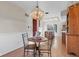 Eat-in dining area situated off of kitchen area, featuring a chandelier and bright natural light at 241 Melissa Ann Ct, Indianapolis, IN 46234