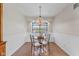 Eat-in dining area with bright natural light and quaint setting with chandelier at 241 Melissa Ann Ct, Indianapolis, IN 46234