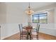 Eat-in dining area with bright natural light and quaint setting at 241 Melissa Ann Ct, Indianapolis, IN 46234