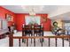 Bright dining room with large windows, dark wood furniture, and stylish décor, perfect for gatherings at 241 Melissa Ann Ct, Indianapolis, IN 46234