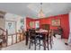 Elegant dining area with stylish lighting, views of the entryway, and a cozy atmosphere for dining at 241 Melissa Ann Ct, Indianapolis, IN 46234