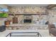 Stunning stone fireplace with a rustic wood mantel at 241 Melissa Ann Ct, Indianapolis, IN 46234
