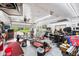 Well-lit garage featuring an open door with an outside view, and a variety of equipment at 241 Melissa Ann Ct, Indianapolis, IN 46234