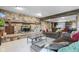 Inviting living room with stone fireplace, comfortable seating, and ample natural light at 241 Melissa Ann Ct, Indianapolis, IN 46234