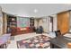 Comfortable living space with built-in shelving, large window, and cozy seating at 241 Melissa Ann Ct, Indianapolis, IN 46234