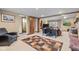 Open living area with desk, fireplace, and comfortable seating at 241 Melissa Ann Ct, Indianapolis, IN 46234